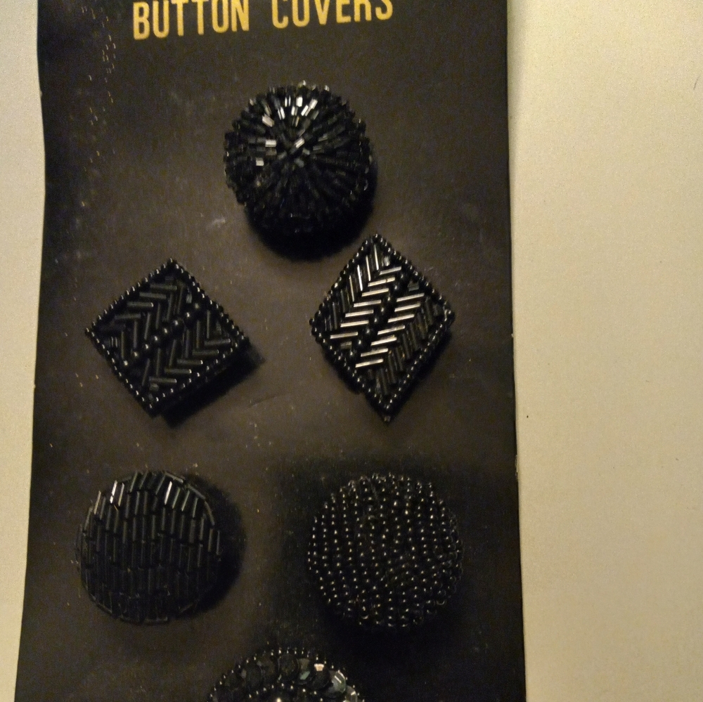Not new,never used on original cardboard 6pc black beaded assorted button covers